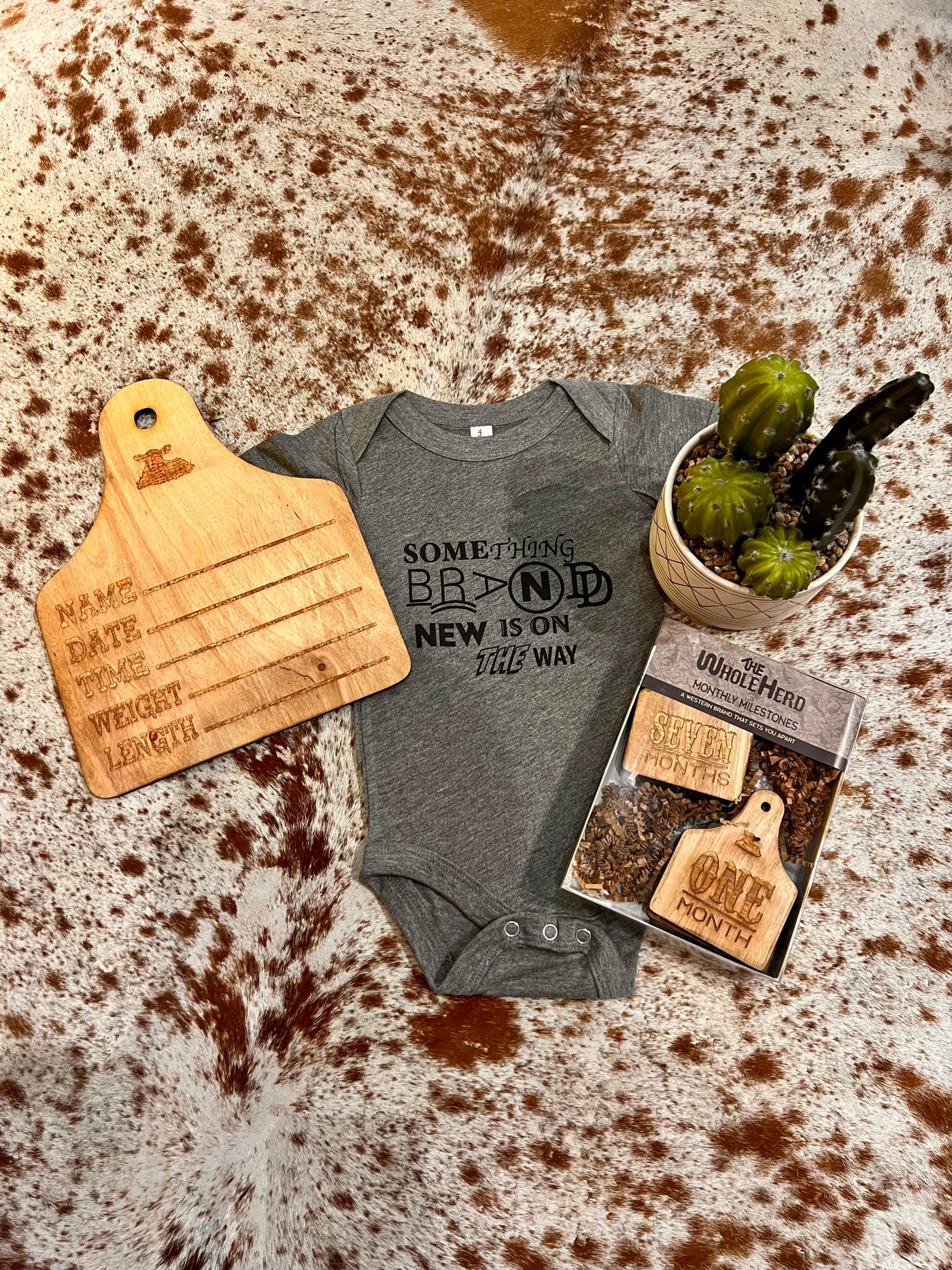 The Whole Herd Baby Announcement Ear Tag